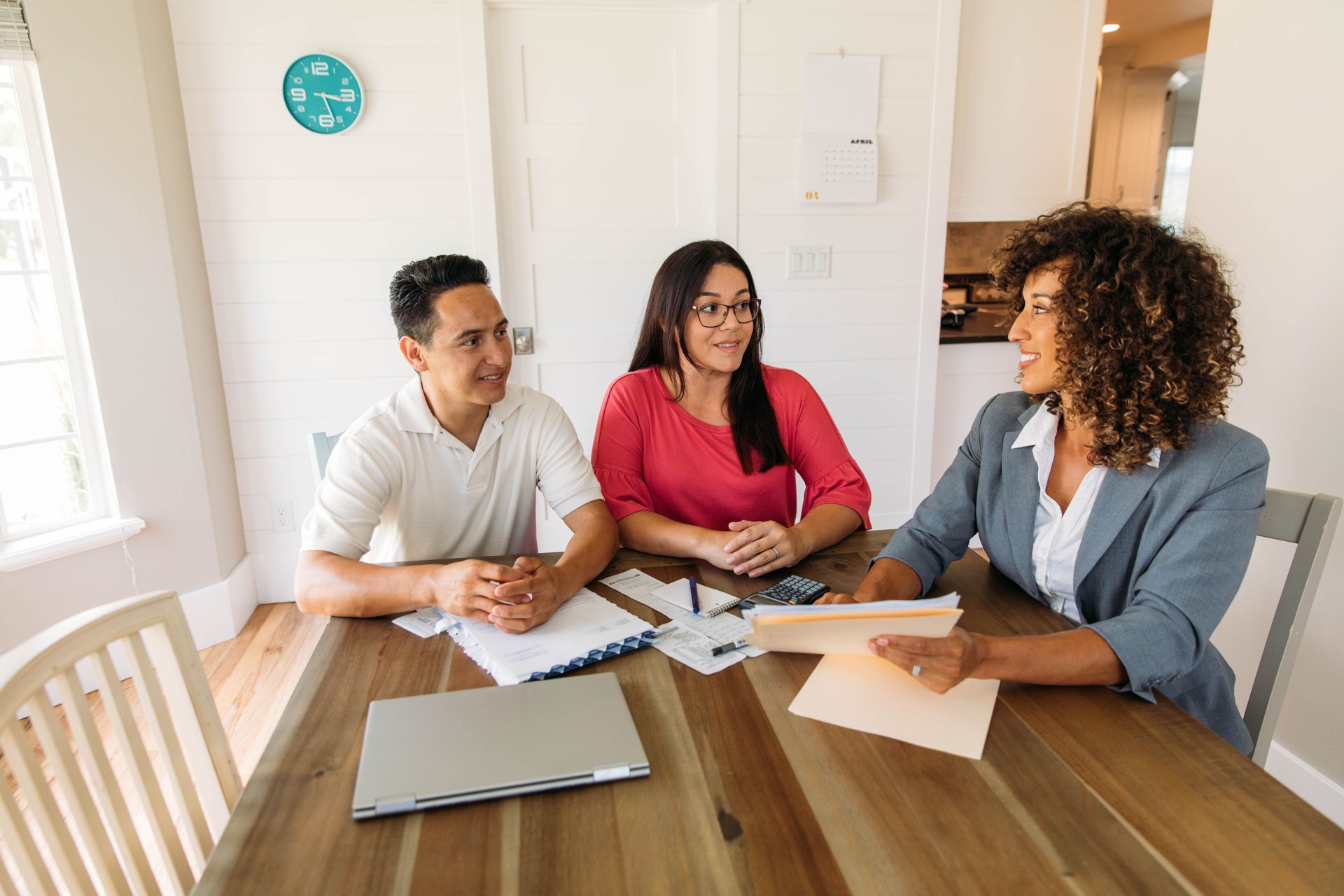 Married Couple Meeting with Financial Advisor